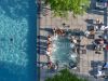 Optima Signature in Downtown Chicago with Aerial view of a hot tub and swimming pool, ideal for relaxing after the moving process.